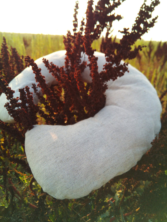 Organic hemp neck pillow filled with buckwheat hulls, Hemp fabric outside hulls inside