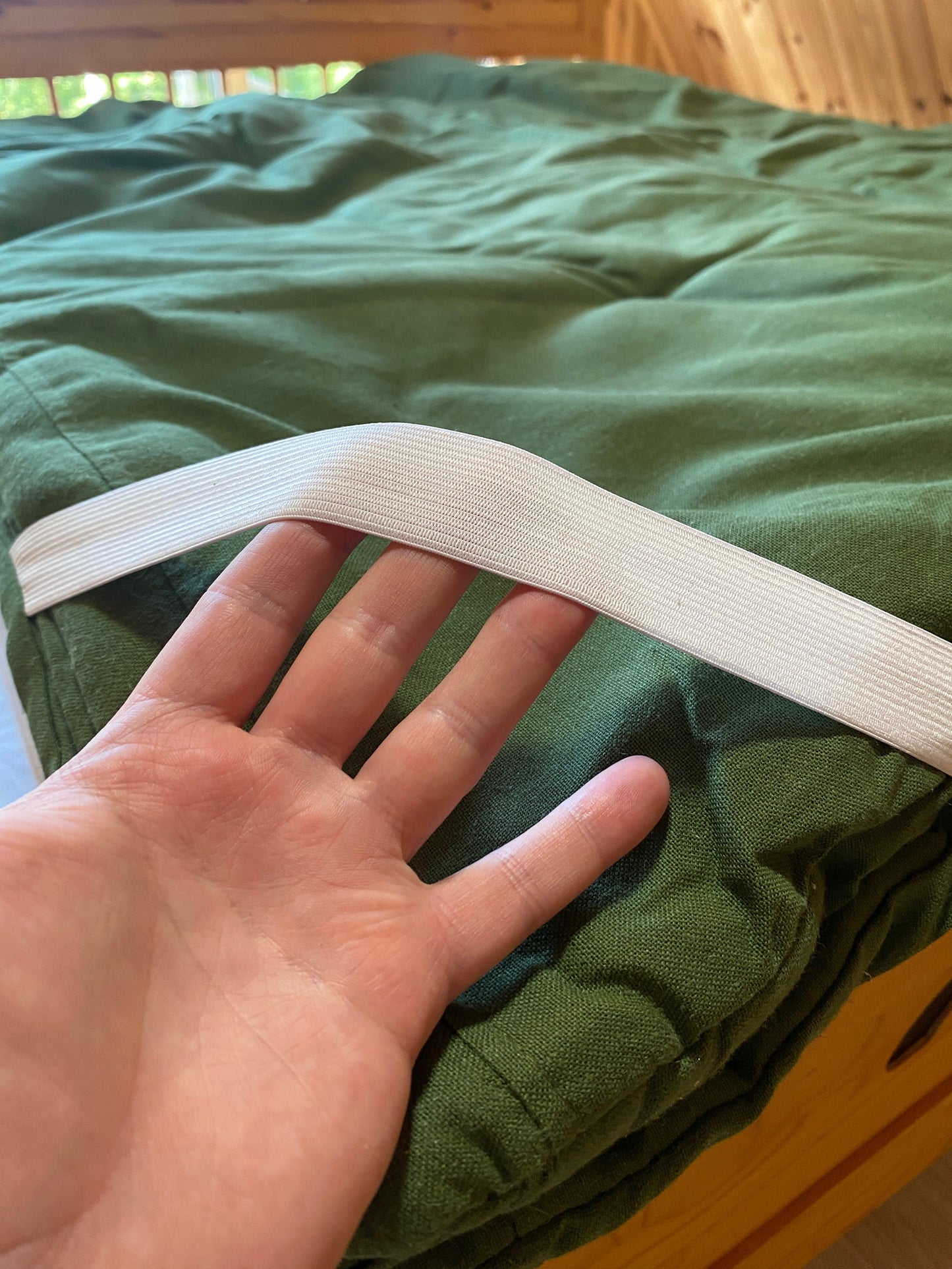 Hemp green topper with elastic bands on the sides