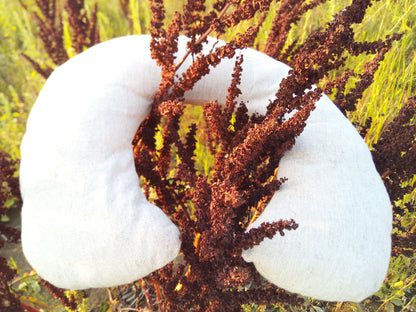 Organic hemp neck pillow filled with buckwheat hulls, Hemp fabric outside hulls inside