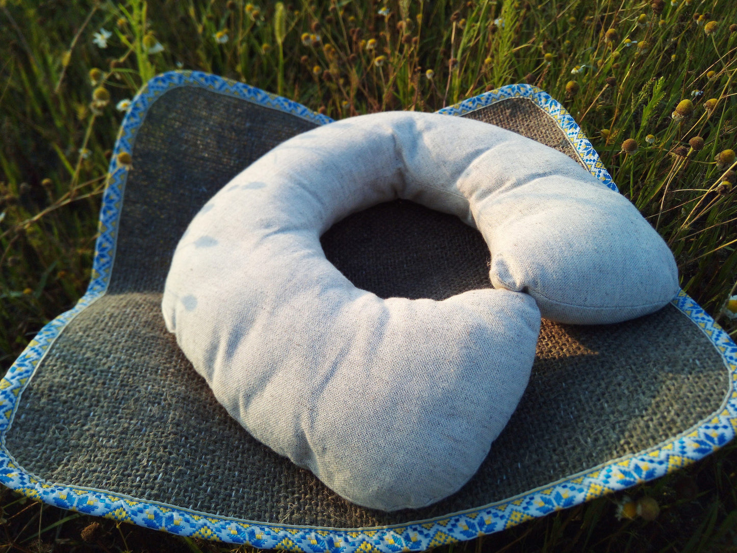 Organic hemp neck pillow filled with buckwheat hulls, Hemp fabric outside hulls inside