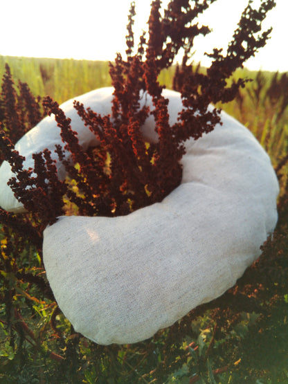 Organic hemp neck pillow filled with buckwheat hulls, Hemp fabric outside hulls inside